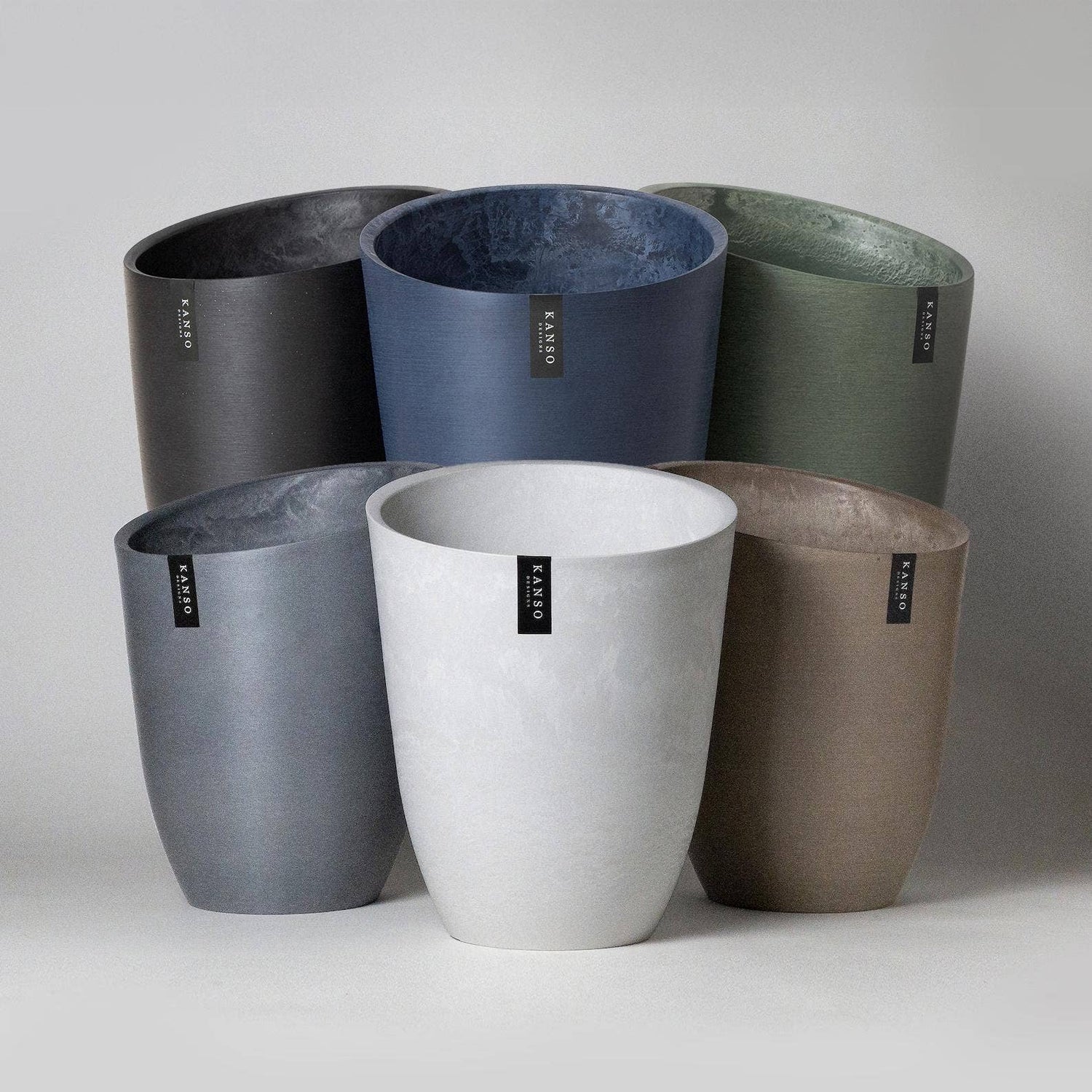Tall modern planter shown as an example for planter sizing and material selection